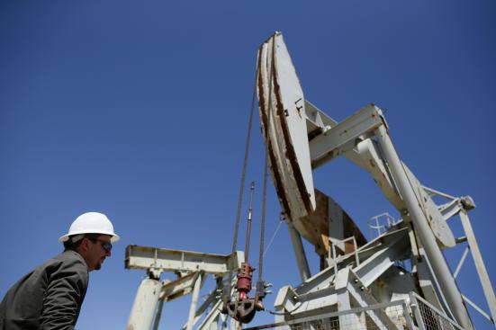 A pumpjack brings oil to the surface in the Monterey Shale, California, April 29, 2013. 